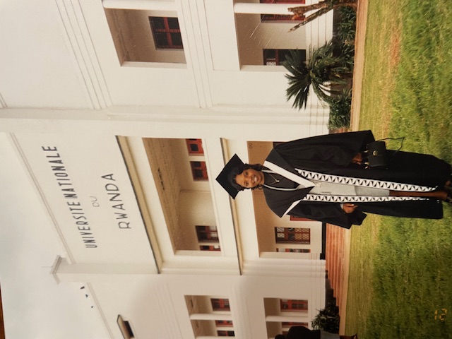 Régine King stands in front of the National University of Rwanda on the day of her graduation